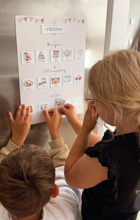 Magnetiskt dagsschema med bildstöd